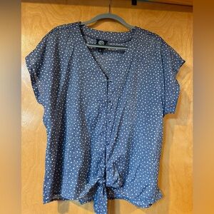 Flirty blouse ties in front with button detail